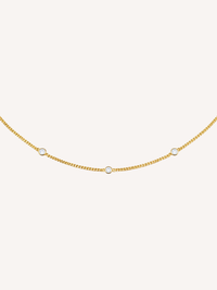 14k gold diamond bezel curb chain necklace with three round diamonds minimalist layered jewelry