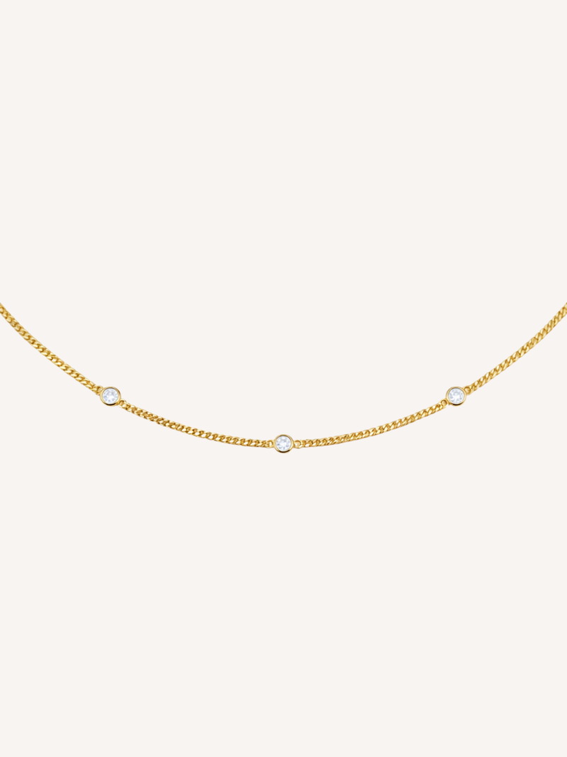 14k gold diamond bezel curb chain necklace with three round diamonds minimalist layered jewelry