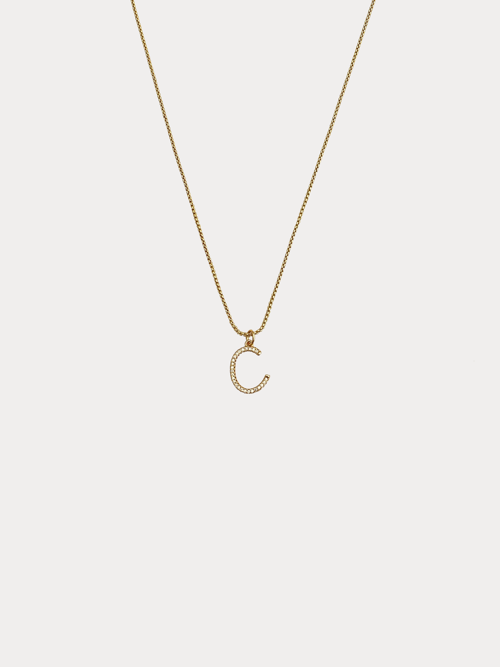 Gold initial necklace with pavé crystal letter pendant