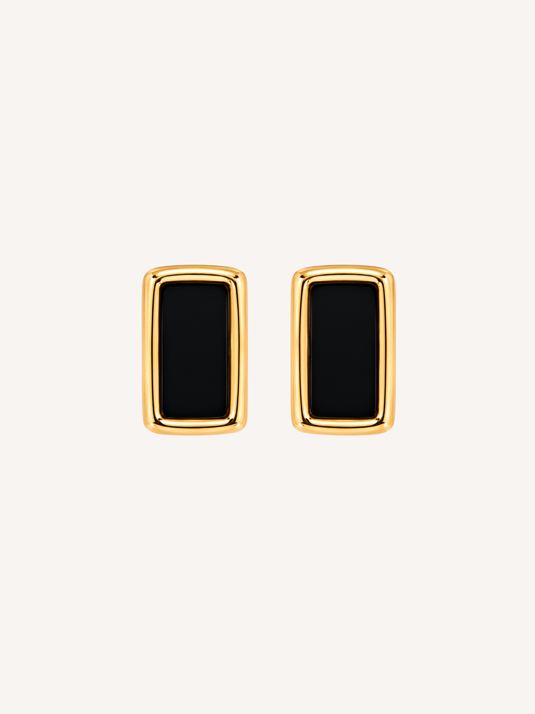 Gold rectangle statement earrings featuring black onyx-inspired stones.