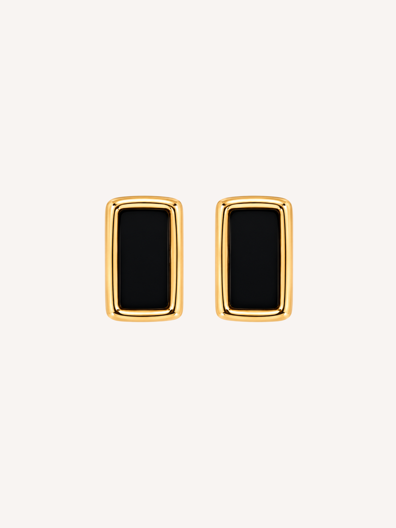 Gold rectangle statement earrings featuring black onyx-inspired stones.