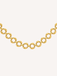 Gold statement link chain necklace featuring bold polished rounded links.