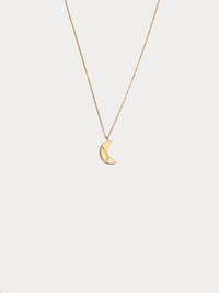Gold Aries crescent moon necklace with constellation detailing