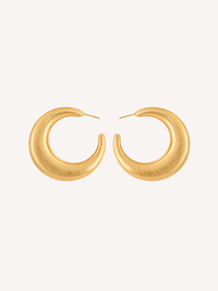 Chunky brushed gold hoop earrings featuring a textured finish and rounded silhouette.