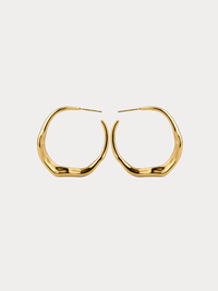 gold sculptural molten hoop earrings with organic fluid shape