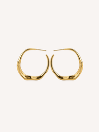 gold sculptural molten hoop earrings with organic fluid shape