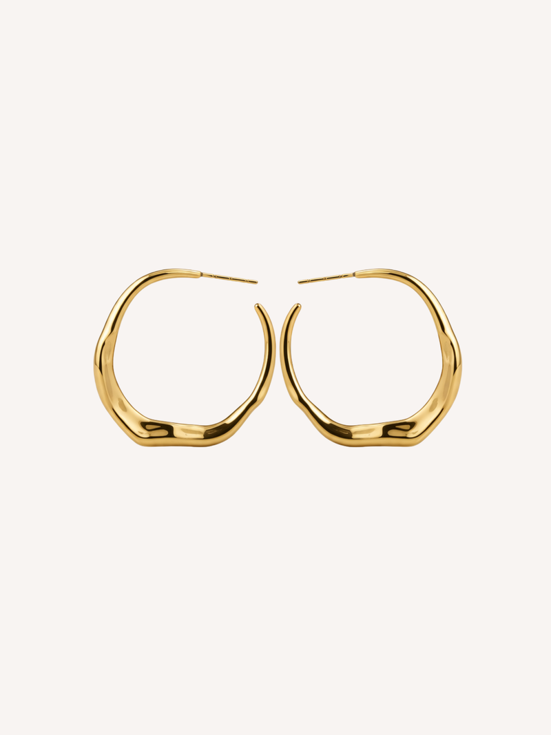 gold sculptural molten hoop earrings with organic fluid shape