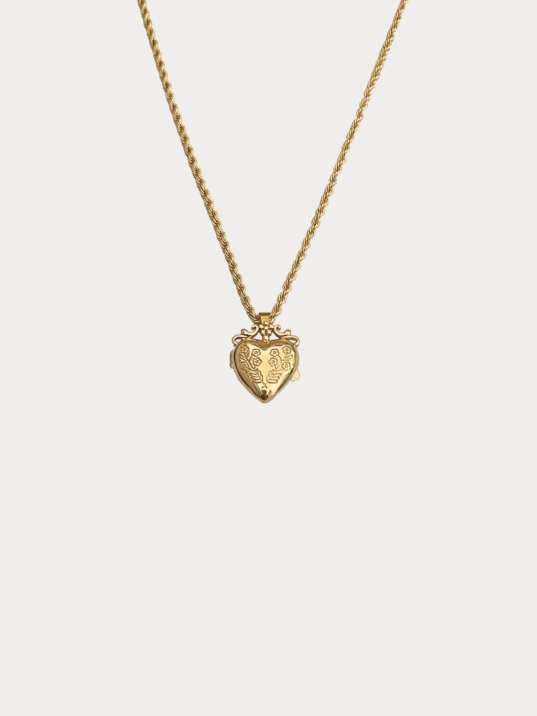 Gold floral heart locket necklace with vintage detailing