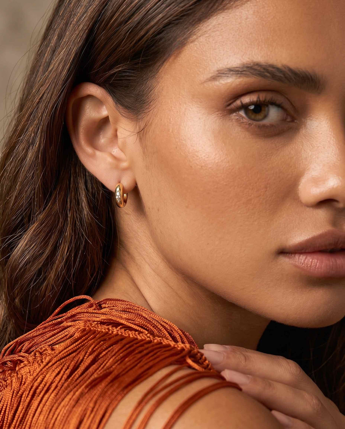 gold plated marquise crystal huggie earrings bezel set cz worn on model