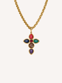 gold cross necklace with multi color gemstones on textured chain
