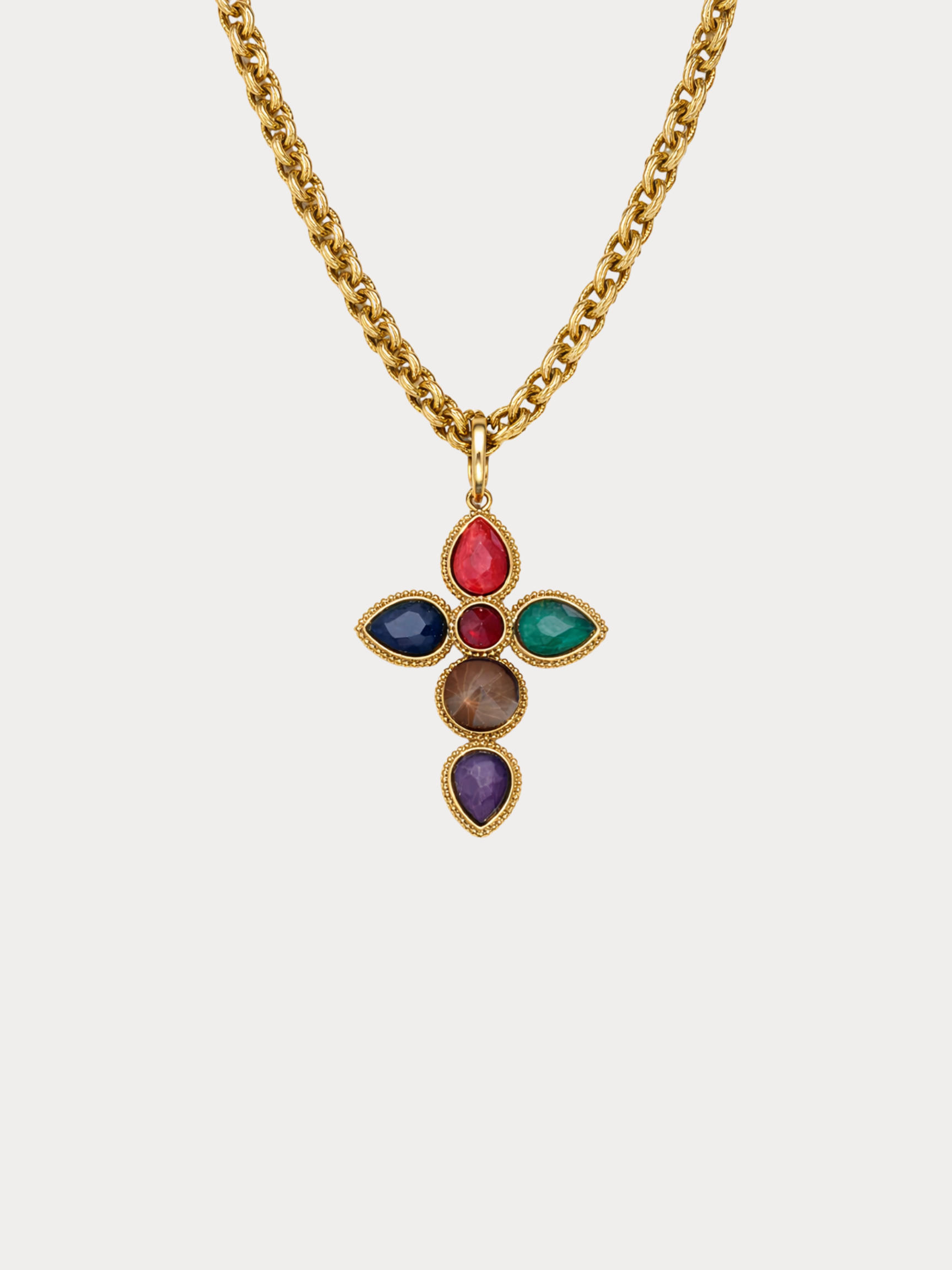 gold cross necklace with multi color gemstones on textured chain