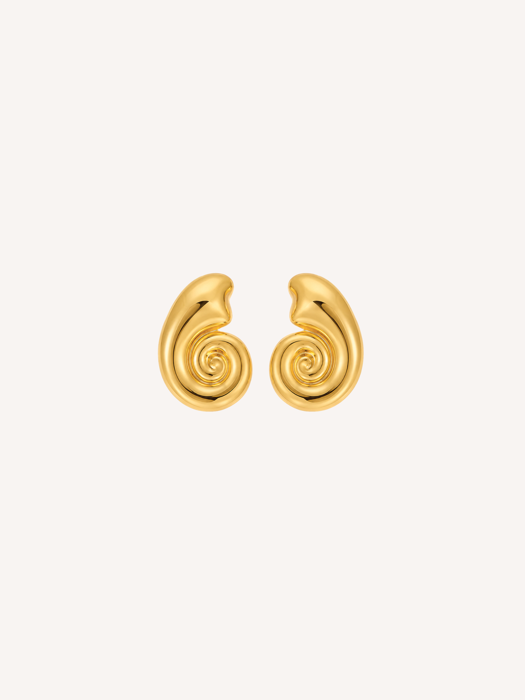 Gold nautilus spiral shell stud earrings.