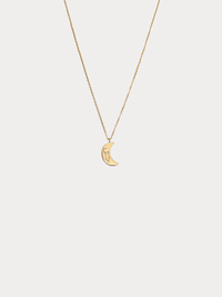 Gold Leo crescent moon necklace with constellation detailing