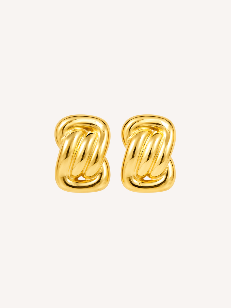Waterproof gold knot earrings with a sculptural polished silhouette in 18k gold dipped stainless steel.