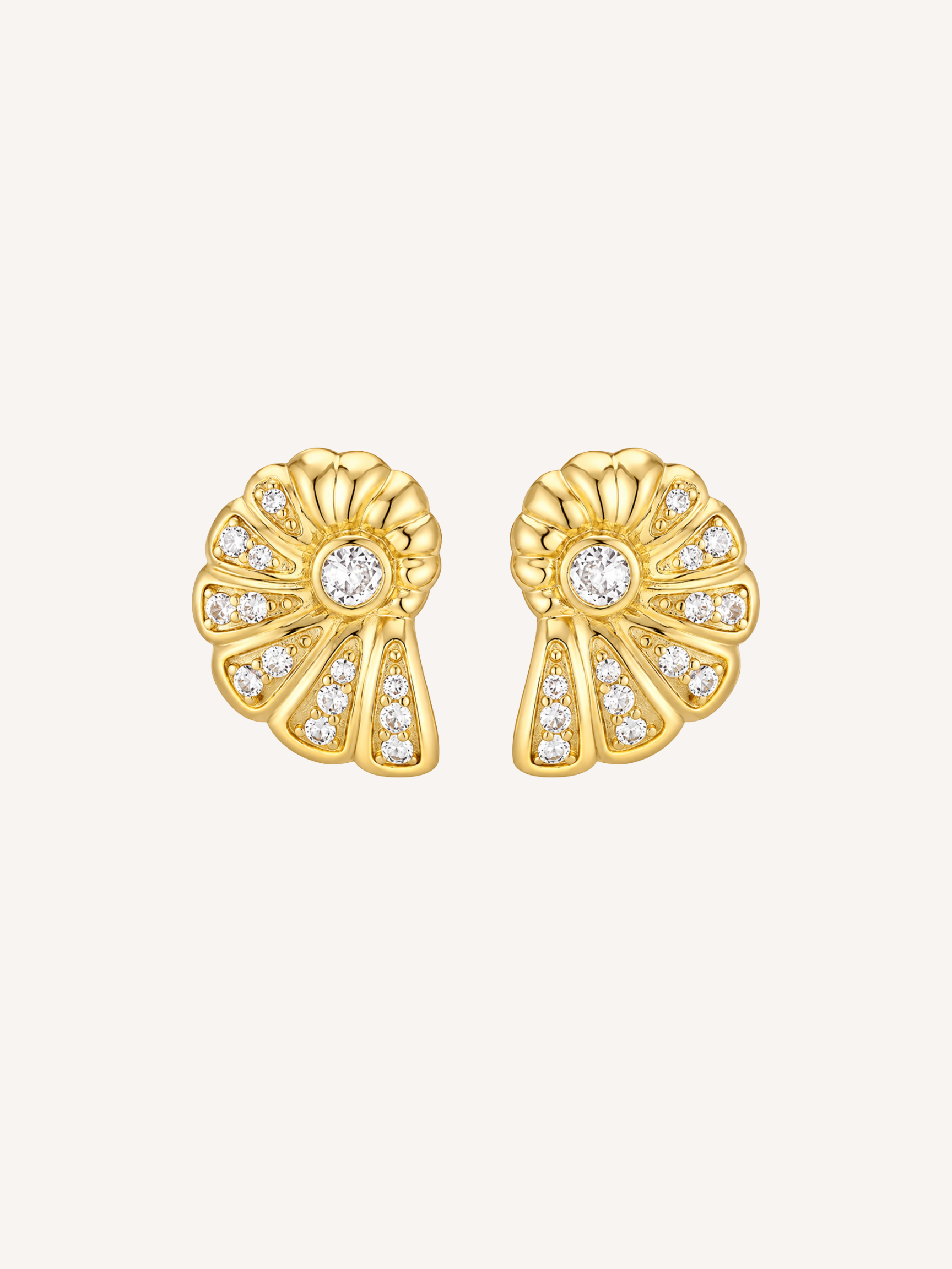 Gold conch shell statement earrings with cubic zirconia accents in waterproof 18k gold dipped stainless steel.