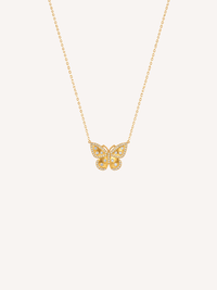Gold butterfly necklace featuring cubic zirconia stones and a delicate pendant design.