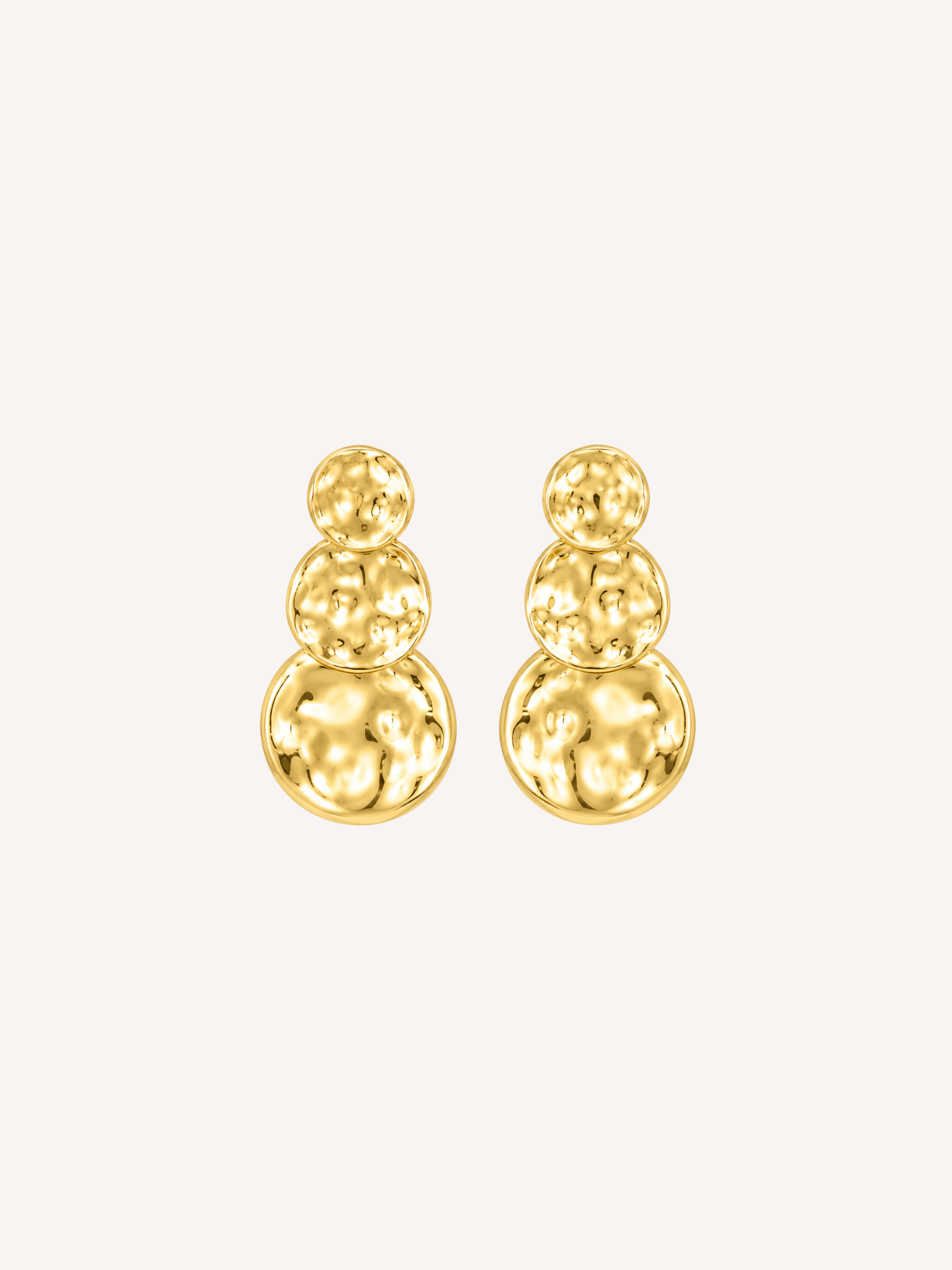 Gold hammered molten statement stud earrings with a triple-disc design.