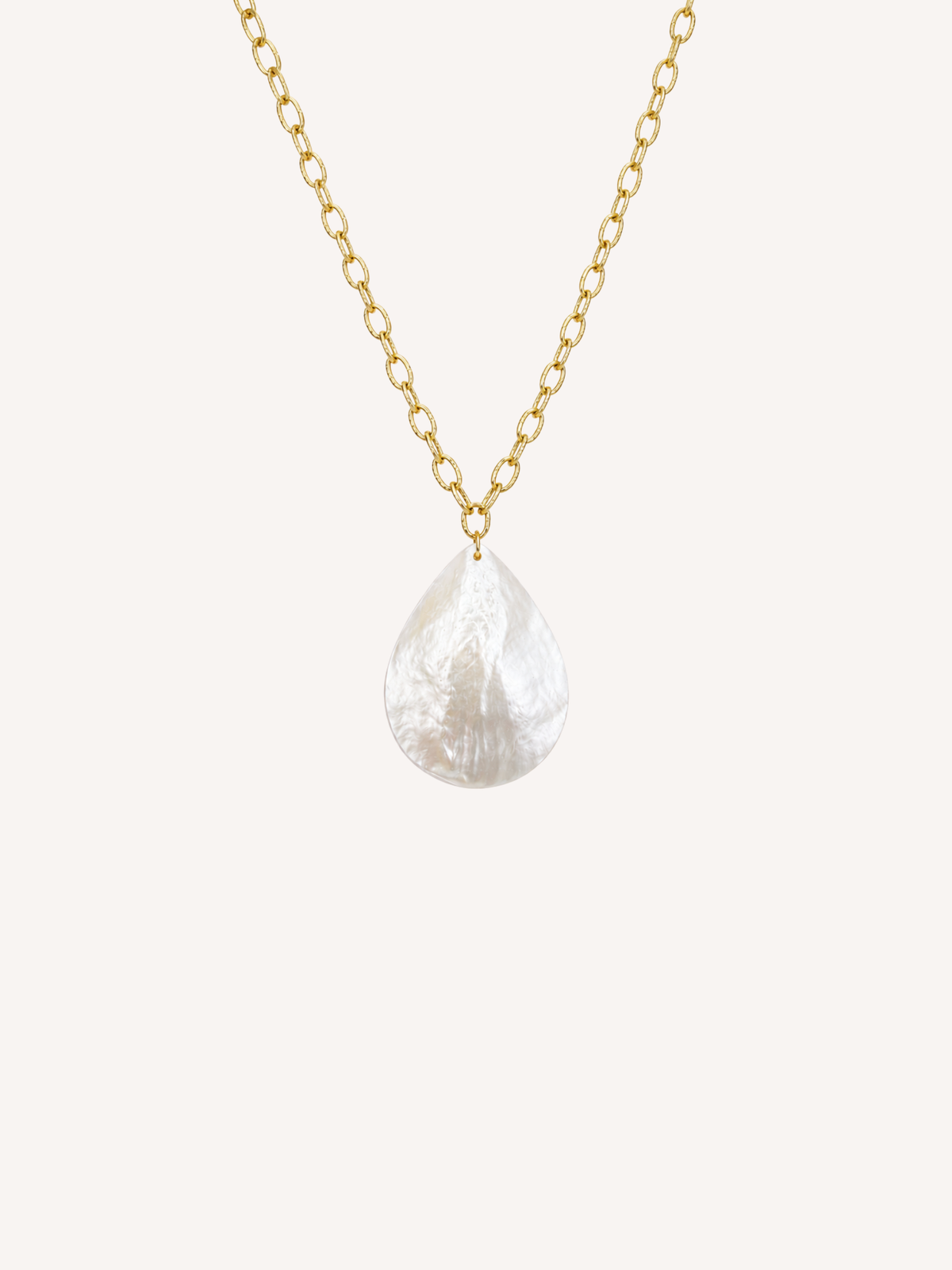 Gold necklace featuring a genuine mother of pearl teardrop pendant.