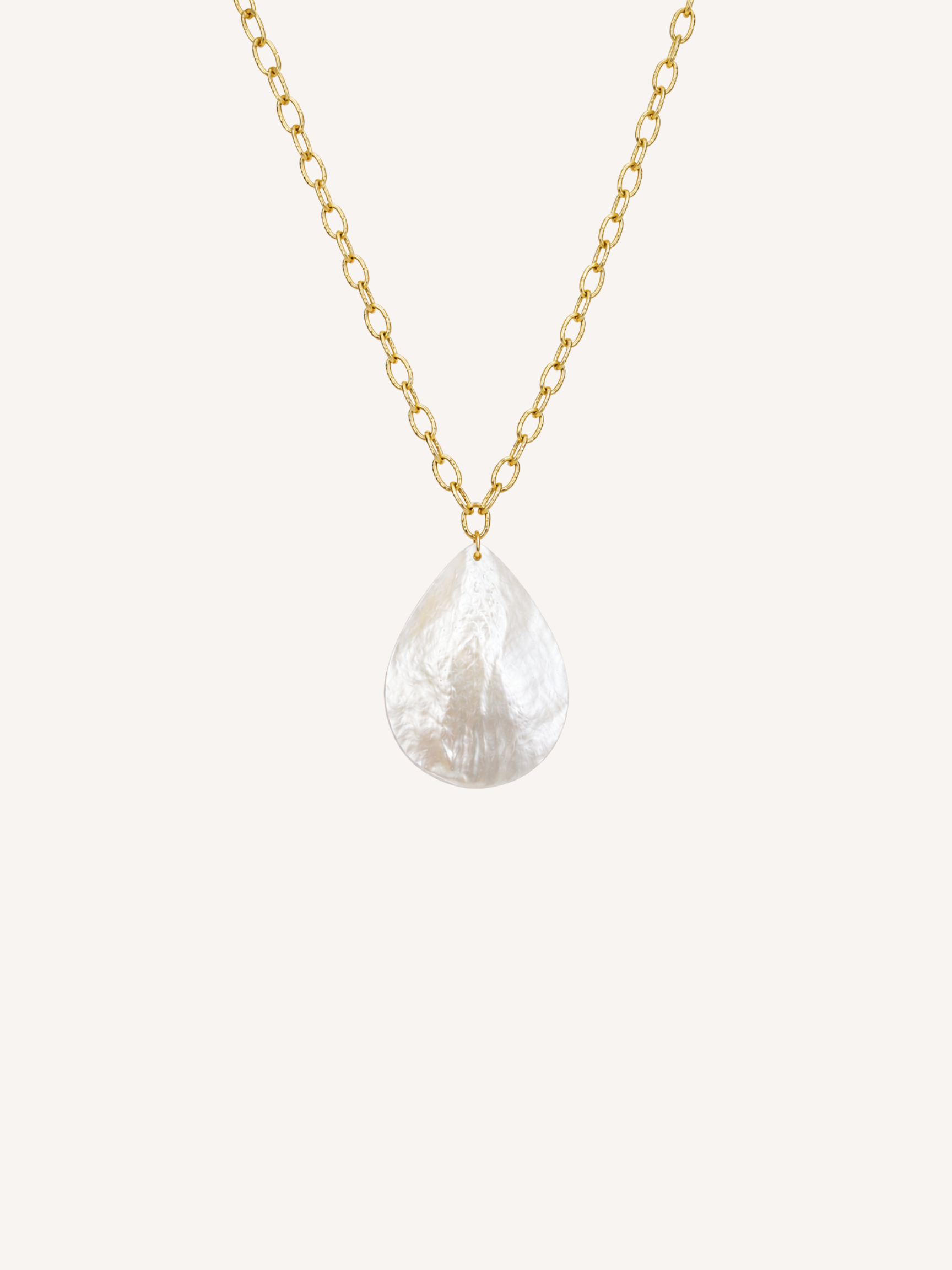 Gold necklace featuring a genuine mother of pearl teardrop pendant.