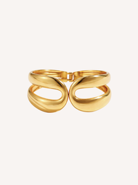 gold sculptural cuff bracelet with fluid organic double loop design