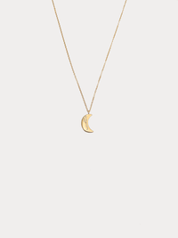 Gold Taurus crescent moon necklace with constellation detailing