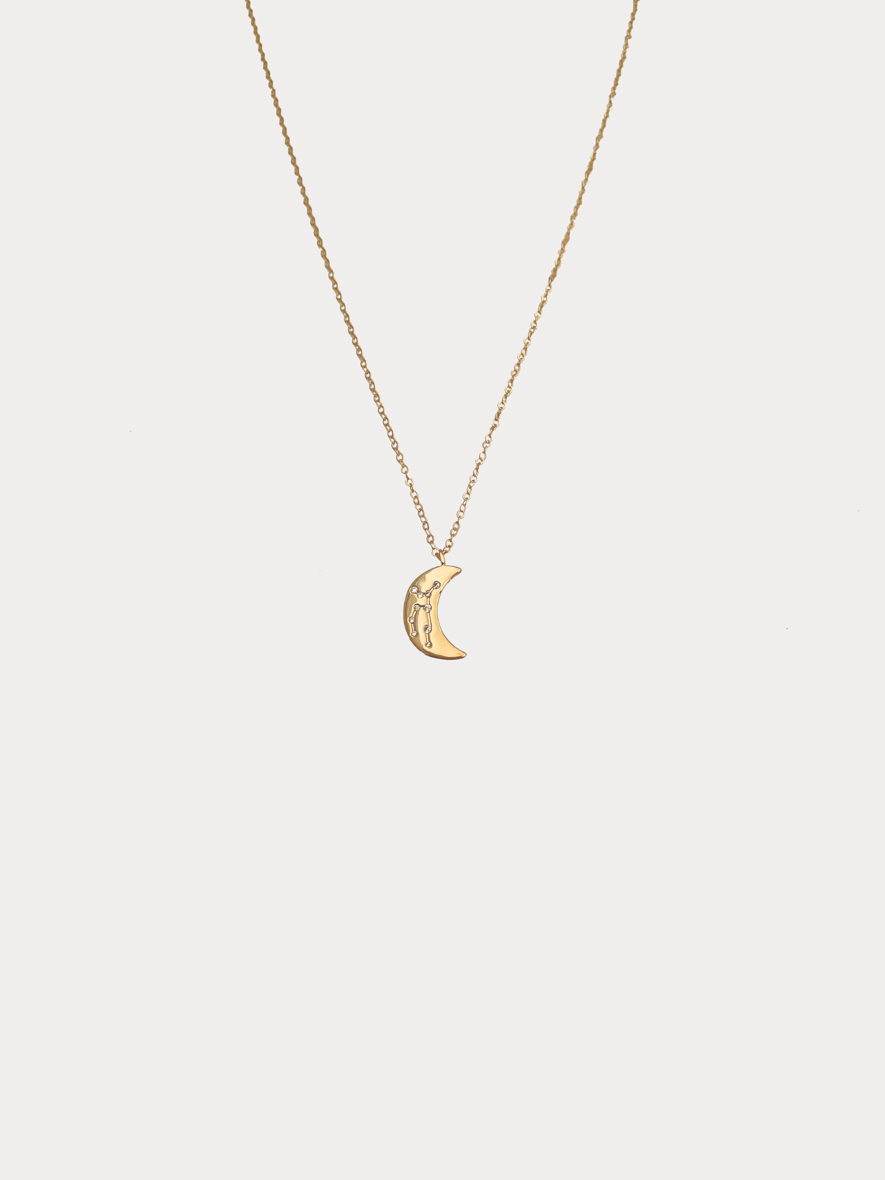 Gold Virgo crescent moon necklace with constellation detailing