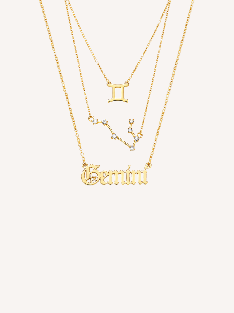 Gold zodiac necklace set featuring a zodiac symbol pendant, constellation necklace, and Old English zodiac nameplate necklace.
